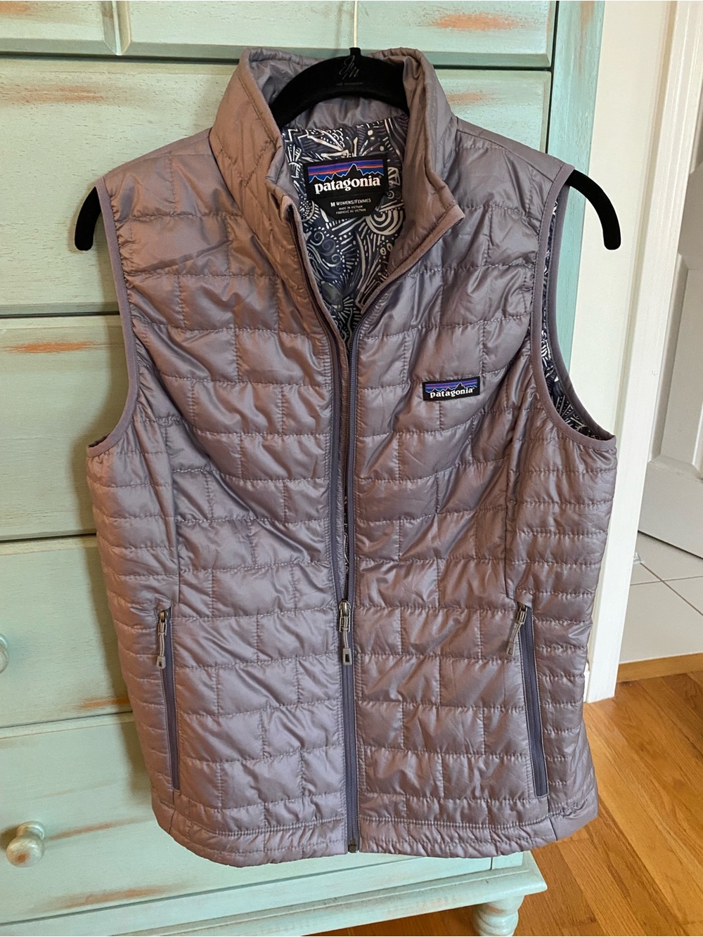 Patagonia Quilted Lightweight Vest in Stone Gray with a light purple tone